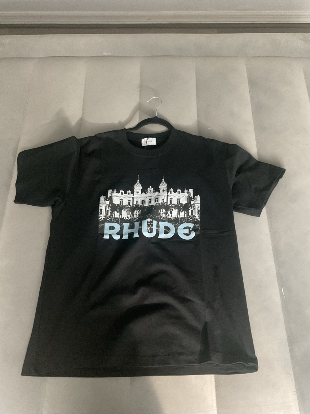 Rhude Black Tee with Light Blue Logo and City Graphic